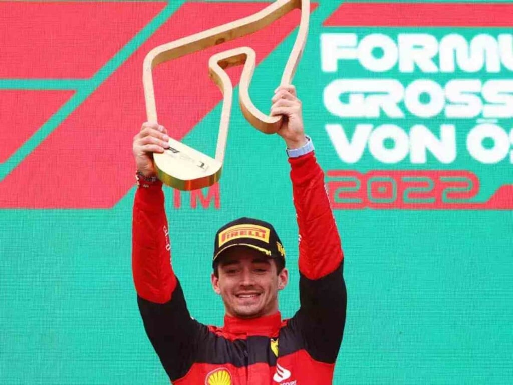 Charles Leclerc on the Austrian GP podium in 2022 (image via Times of India)