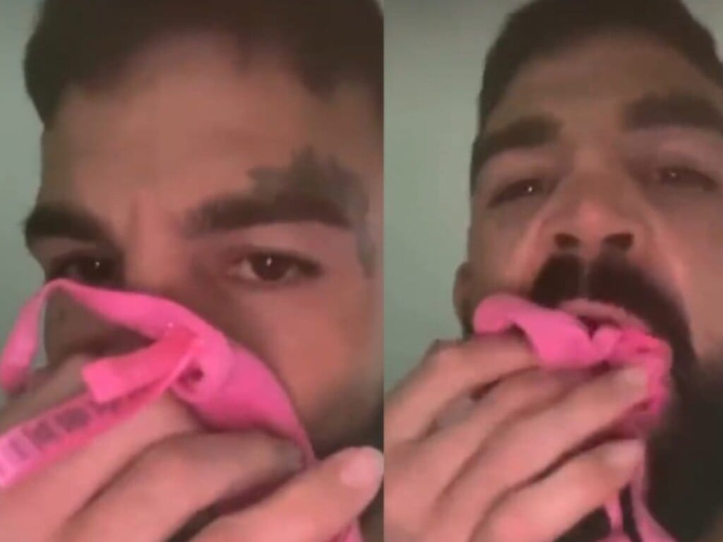 Mike Perry sniffs female lingerie (Image Courtesy: Twitter) 
