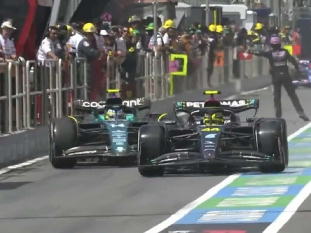 The incident involving Lewis Hamilton and Fernando Alonso in the pitlane, image via GP Fans.