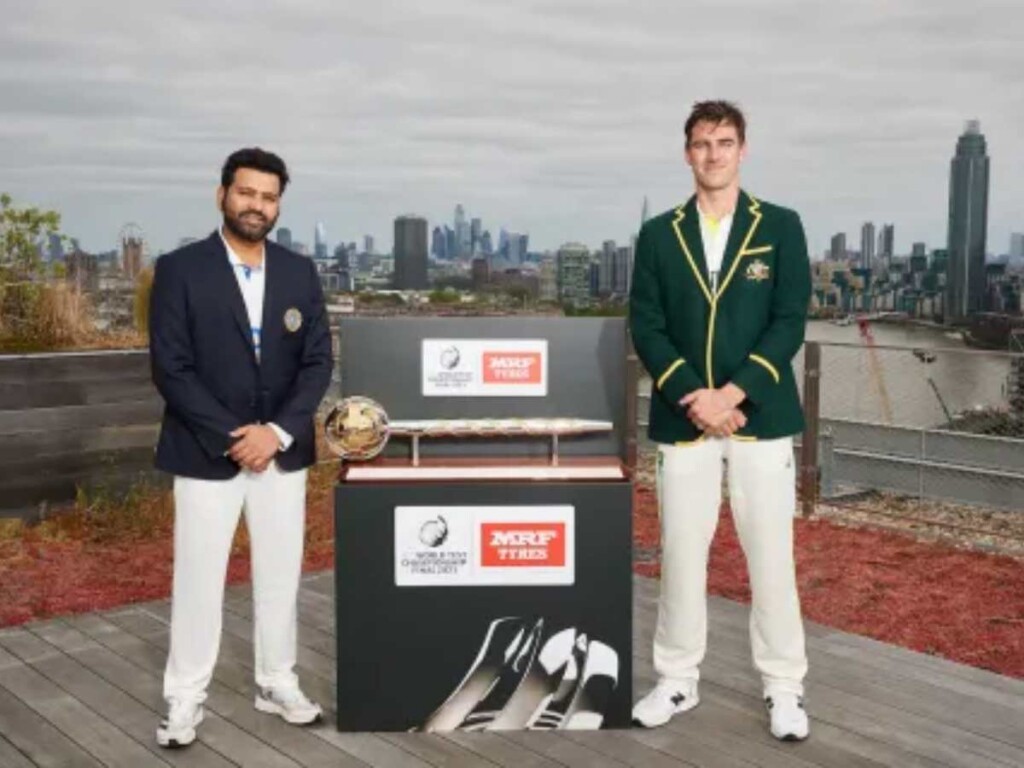 Rohit Sharma and Pat Cummins pose with the ICC Test mace