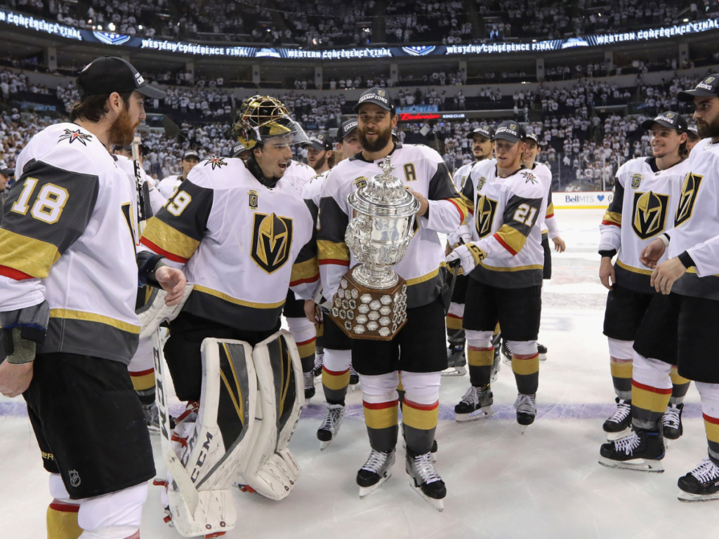 Vegas Golden Knights lifts Stanley Cup trophy [Image Credit: The NY Times]