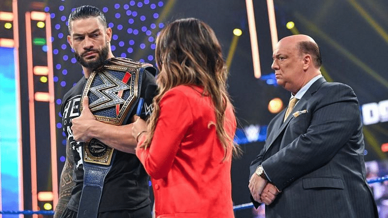 Roman Reigns, Kayla Braxton and Paul Heyman