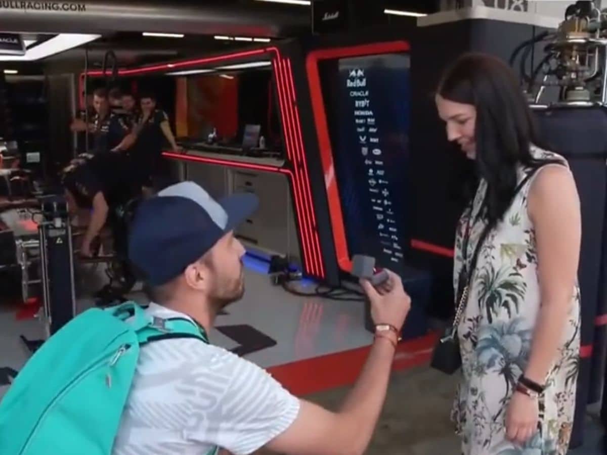 “Even if he’s caught cheating, he’ll be let off lightly” – Fans react as Red Bull man proposes girlfriend at their garage, digs out cost cap scandal