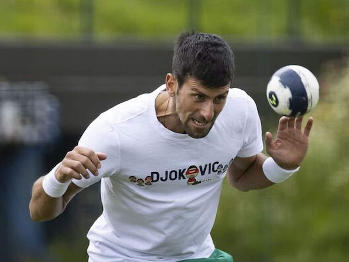 Novak Djokovic halts his training to play football with young fans in Montenegro