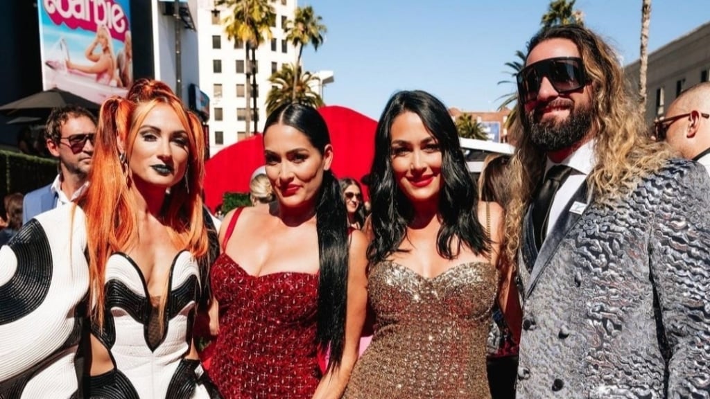 Becky Lynch and Seth Rollins with The Garcia Twins 