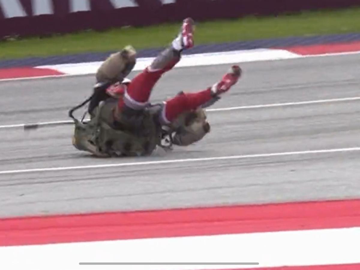 WATCH: “Red Bull gives you wings” – Fans react as a jetpack rider crashes during the parade lap at the Austrian GP