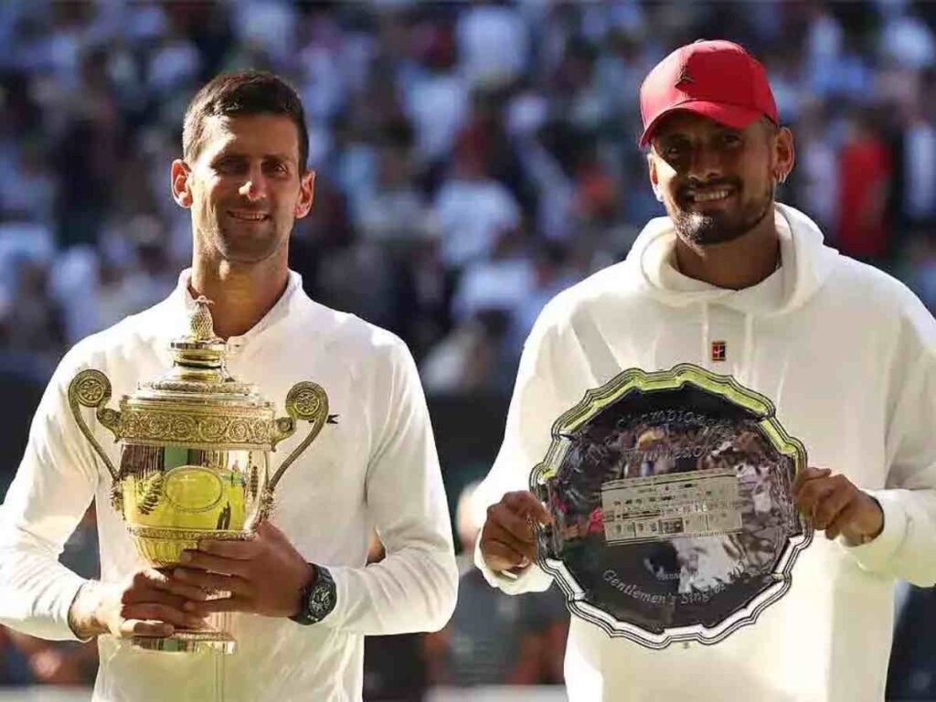 Novak Djokovic(left) and Nick Kyrgios(right) pose with their trophies after the 2022 Wimbledon final.