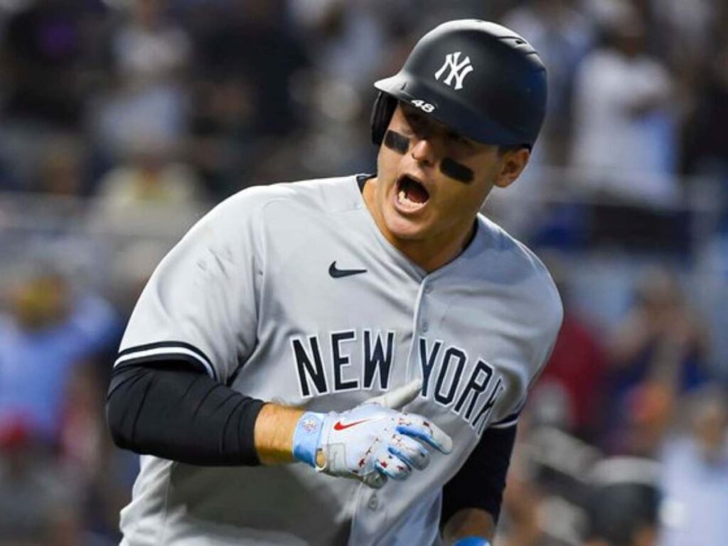 New York Yankees Baseball star Anthony Rizzo celebrating a Home Run.