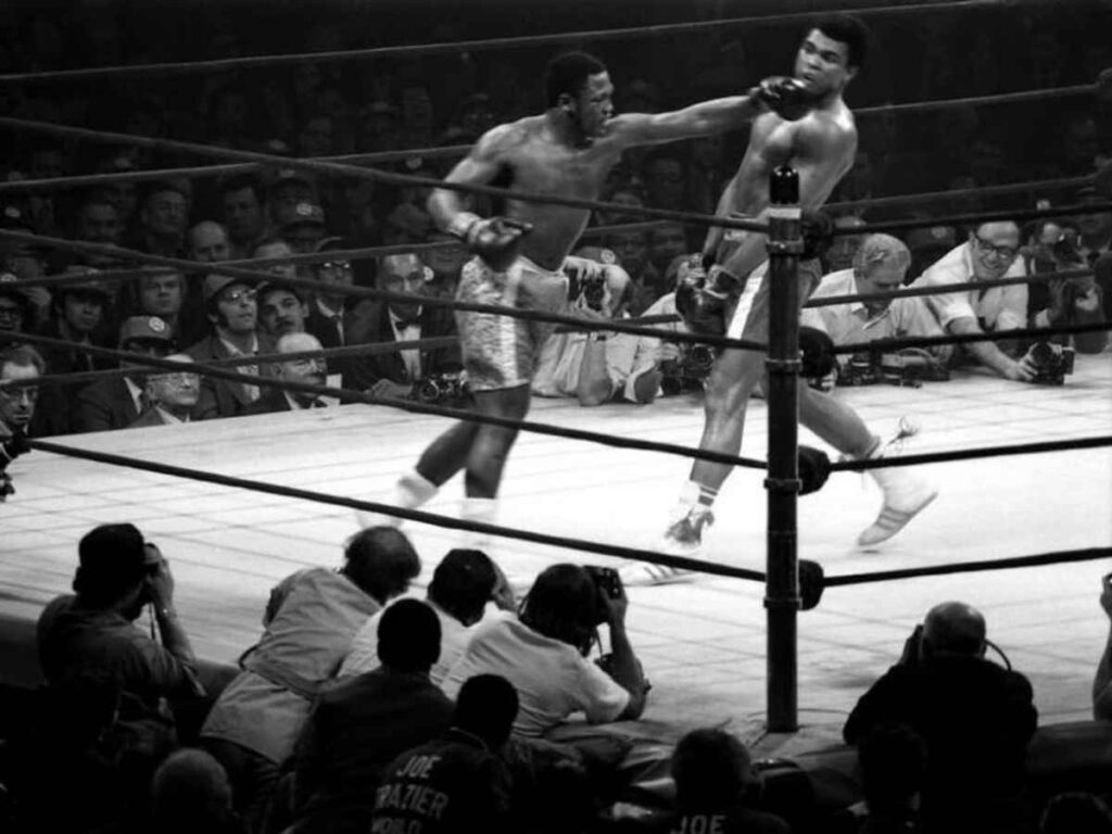 Muhammad Ali dodging punches in the ring 