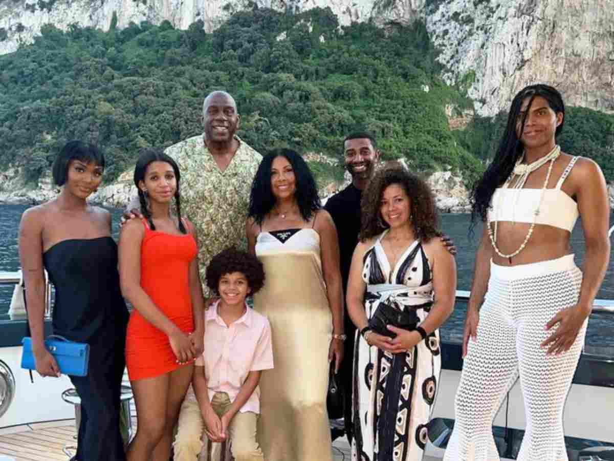 “Got that n***a standing away from the group” – Magic Johnson shares BIZARRE FAMILY PHOTO, NBA Twitter makes jokes at his son EJ’s expense