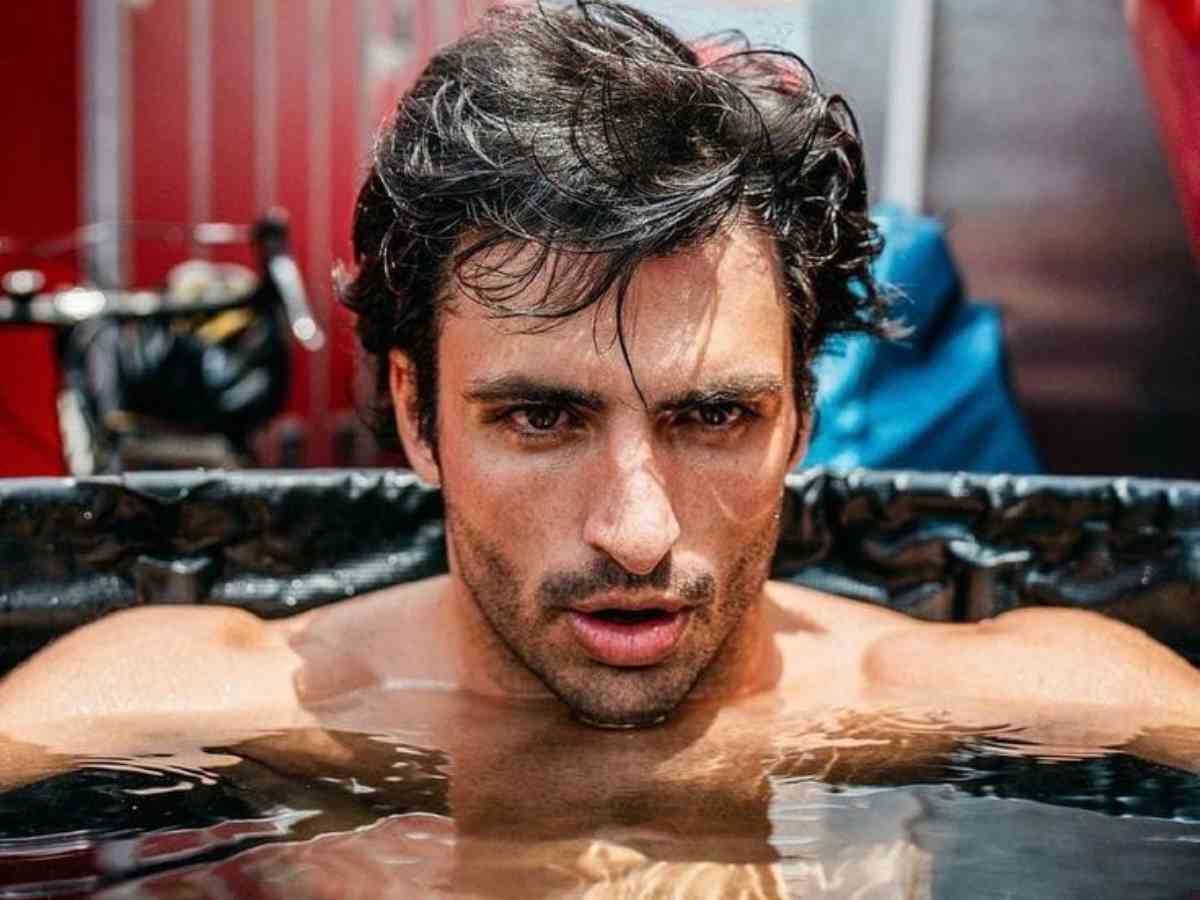 “Stop posting thirst traps, start building fast cars” – F1 fans troll Ferrari for releasing Carlos Sainz’s ice bath clips after poor Hungarian GP Qualifying 