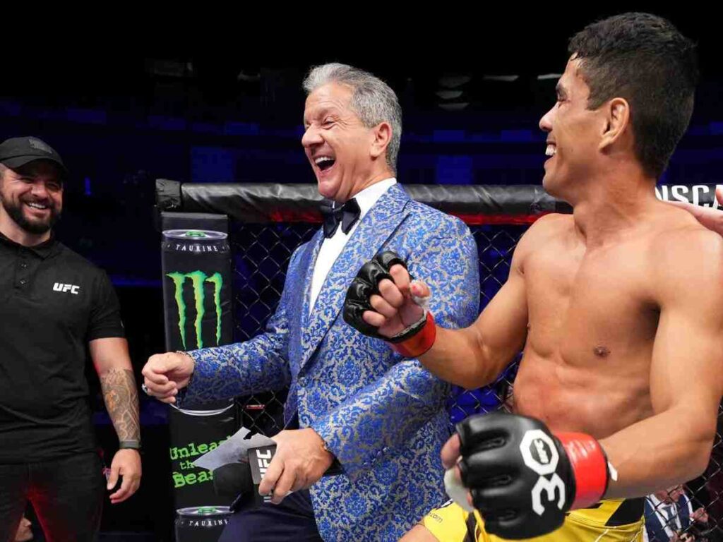 Jafel Filho celebrates with Bruce Buffer