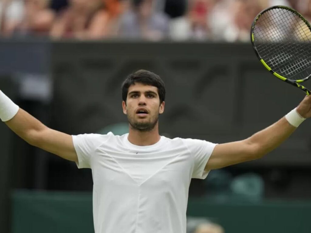 Carlos Alcaraz celebrates after winning a match.