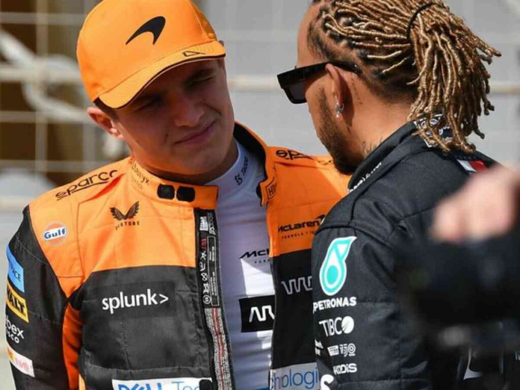 Lando Norris looking at Lewis Hamilton