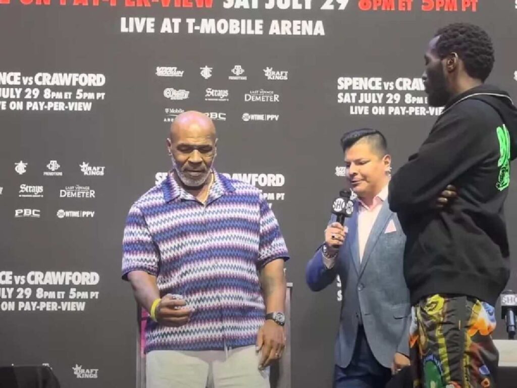 Mike Tyson conducting the ceremonial coin toss for the super fight