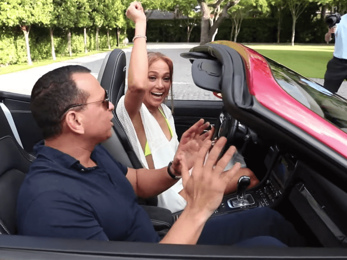 Alex Rodriguez STRIKES a pose with iconic red Porsche he once lavishly gifted ex-Jennifer Lopez