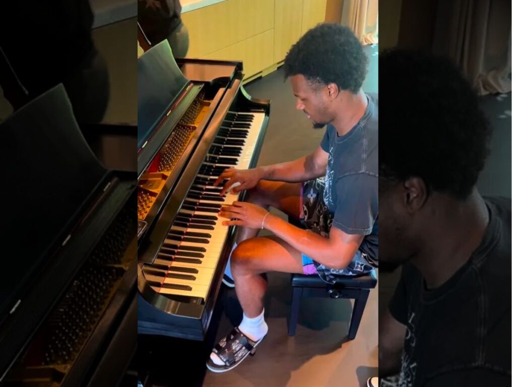 Bronny James playing the piano