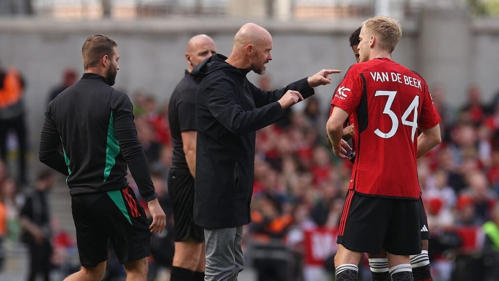 Eric Ten hag explaining tactics mid-match to Van de Beek