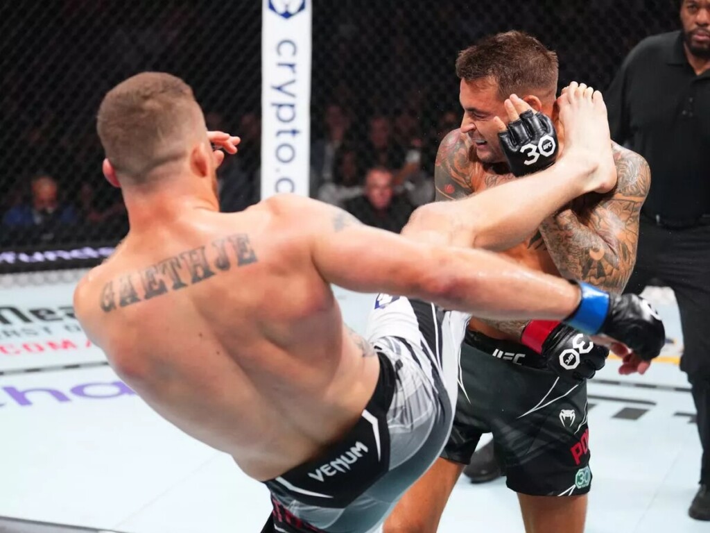 Justin Gaethje lands a head kick on Dustin Poirier at UFC 291