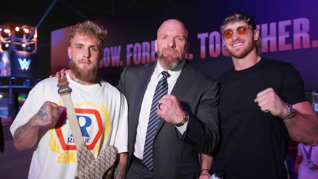 Jake Paul, Triple H, and Logan Paul 