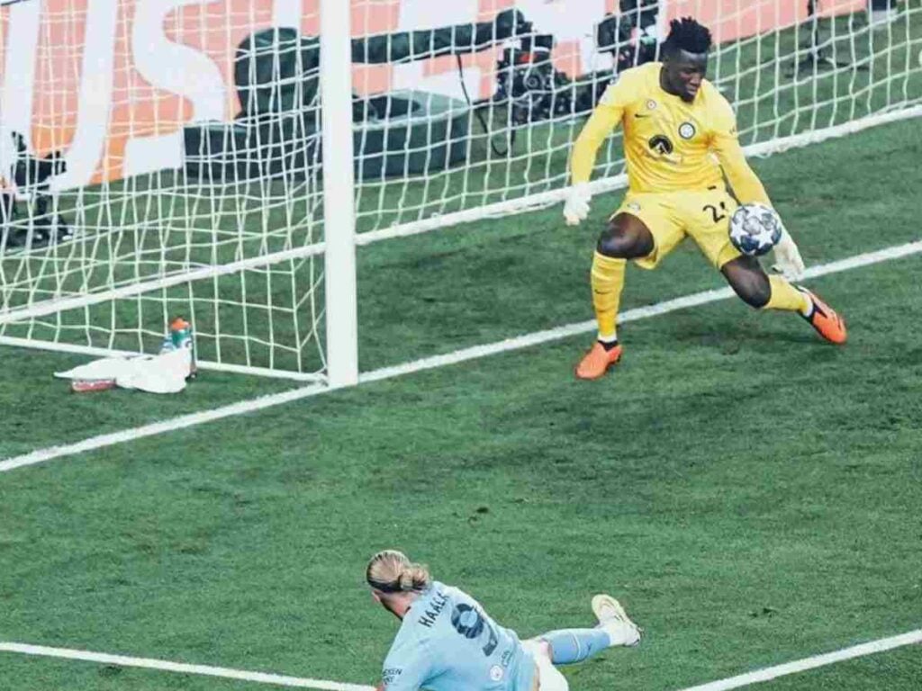 Onana Making a crucial save to Erling Haaland's Shot in the UCL final