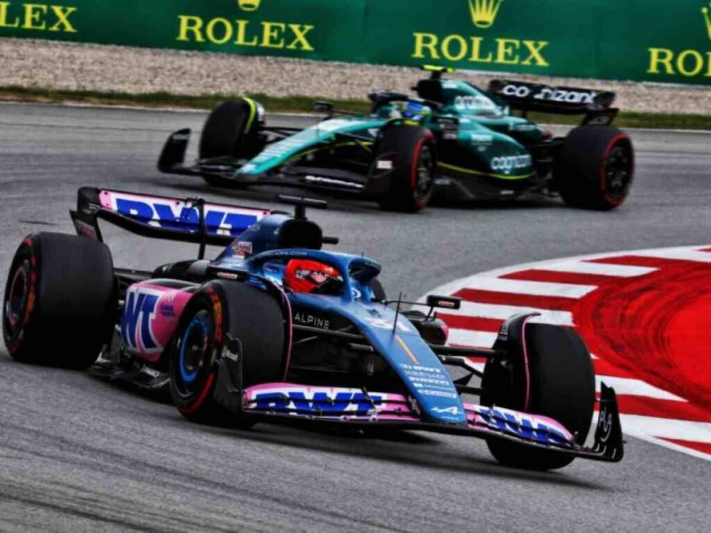Aston Martin claims they will close the gap with Red Bull within 12 months 1 Alpine's Esteban Ocon racing in front of Fernando Alonso in the Aston Martin (image via F1i.com)