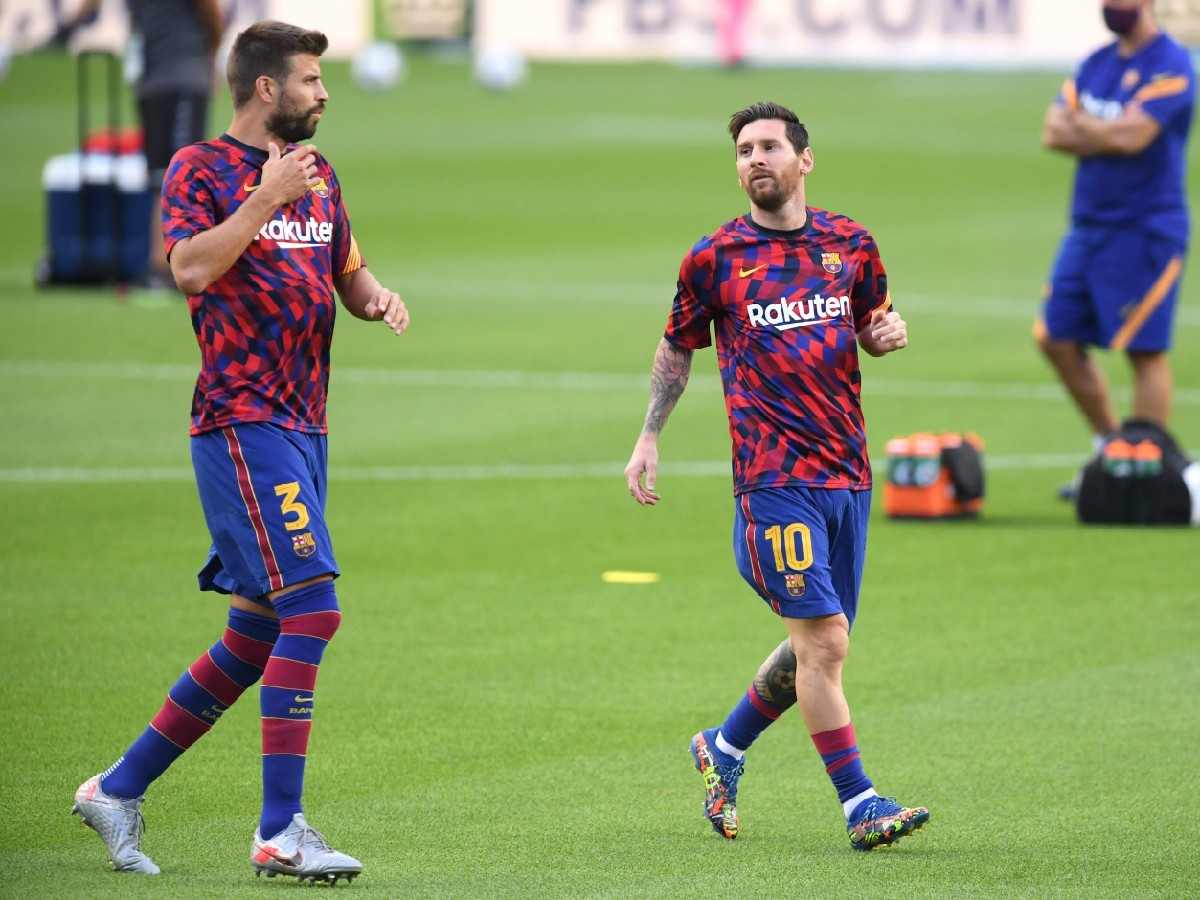 Gerard Pique and Lionel Messi