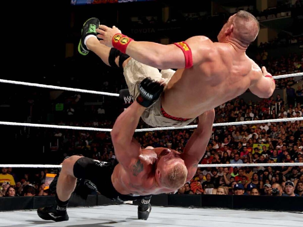 Brock Lesnar suplexing John Cena