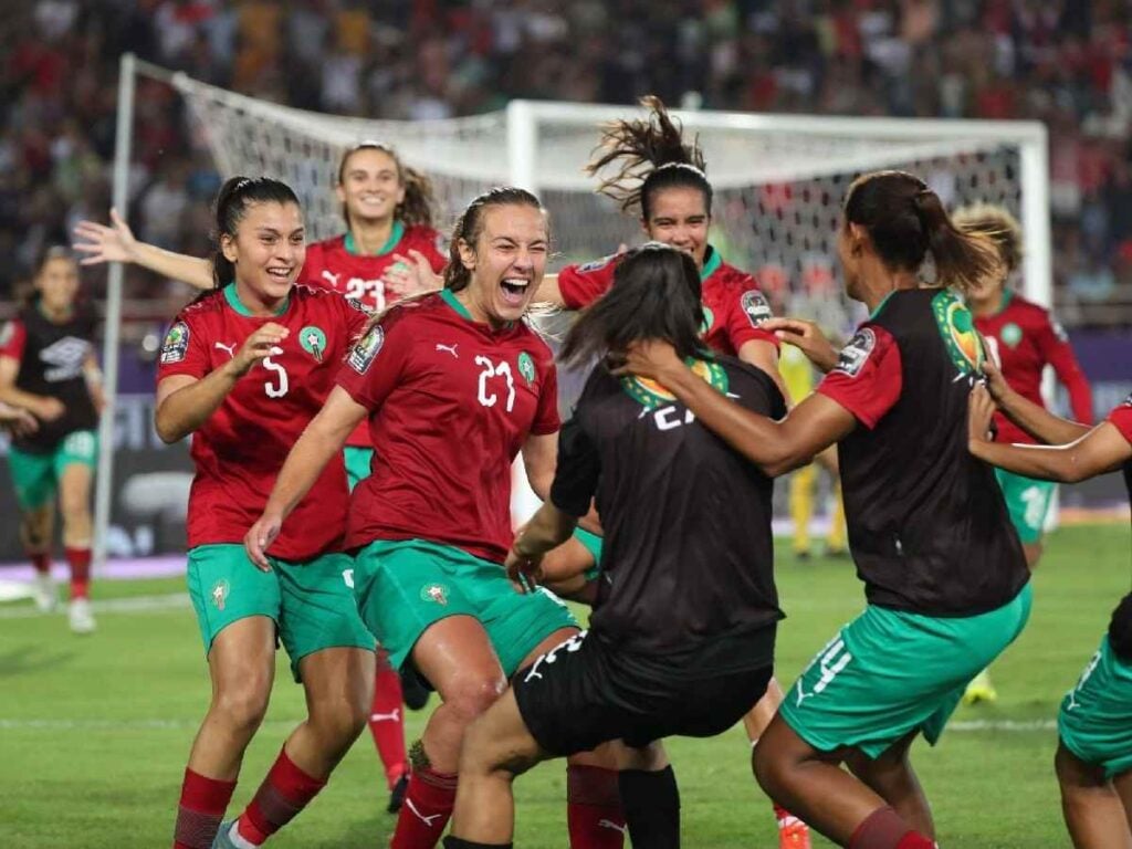 The Moroccon team celebrating after scoring a goal 