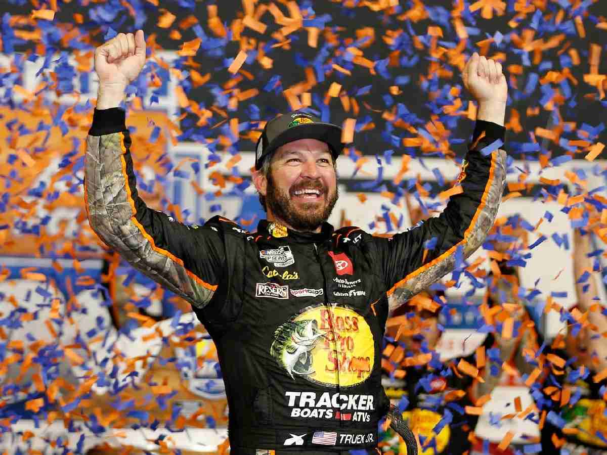 Why did Martin Truex Jr. sign a one-year contract extension with JGR?