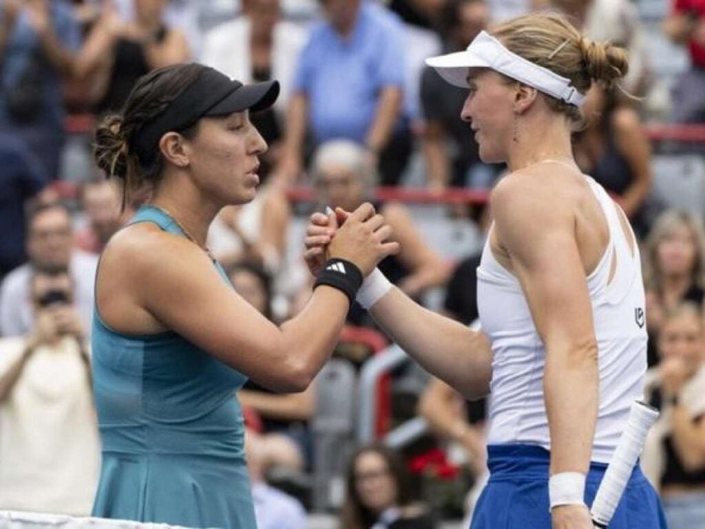 Jessica Pegula and Liudmila Samsonova congratulate each other after the match