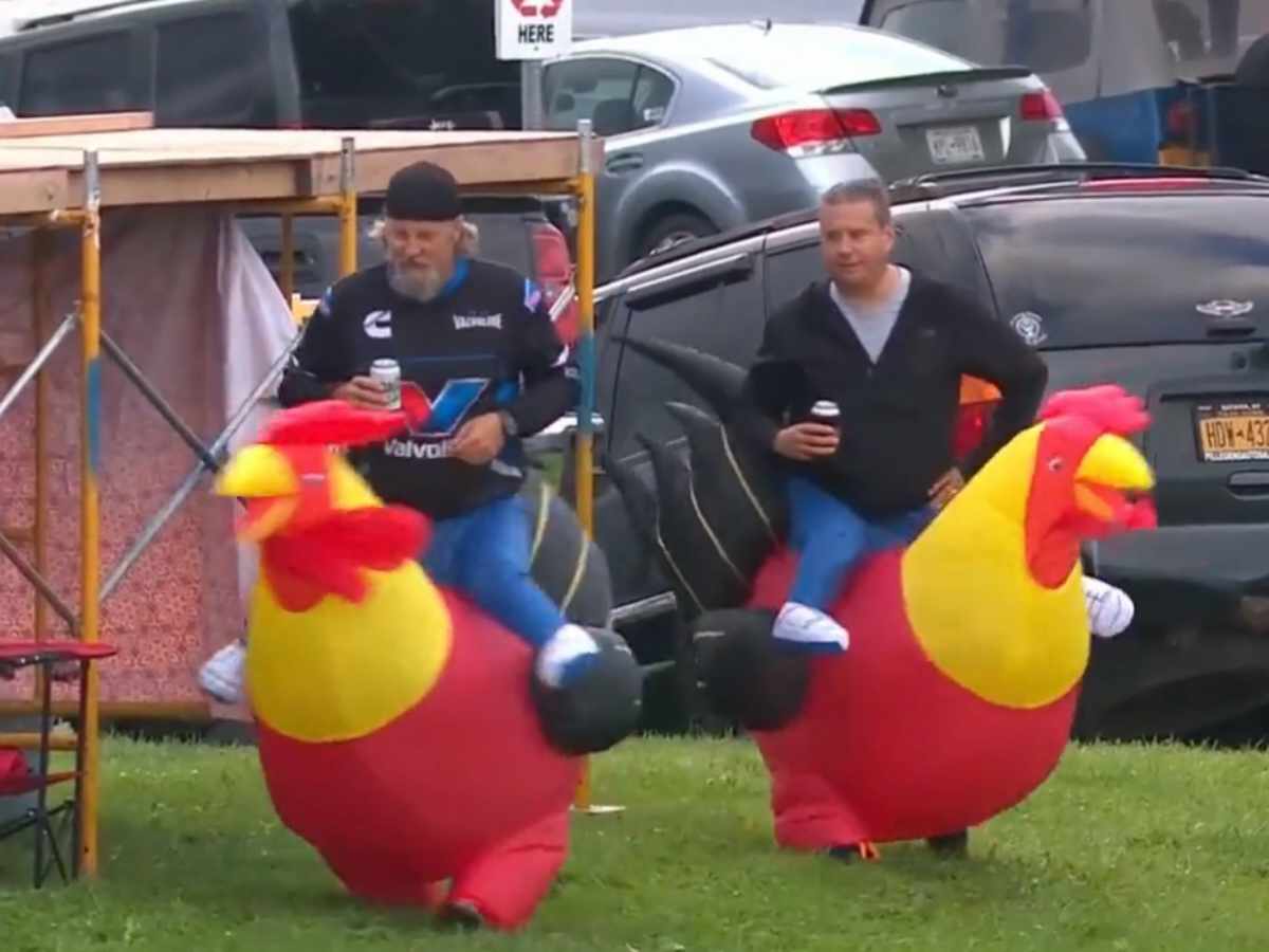 WATCH: “They drink bud light”- Two race fans spotted in a hilarious chicken-riding costume during ARCA race at Watkins Glen, social media reacts