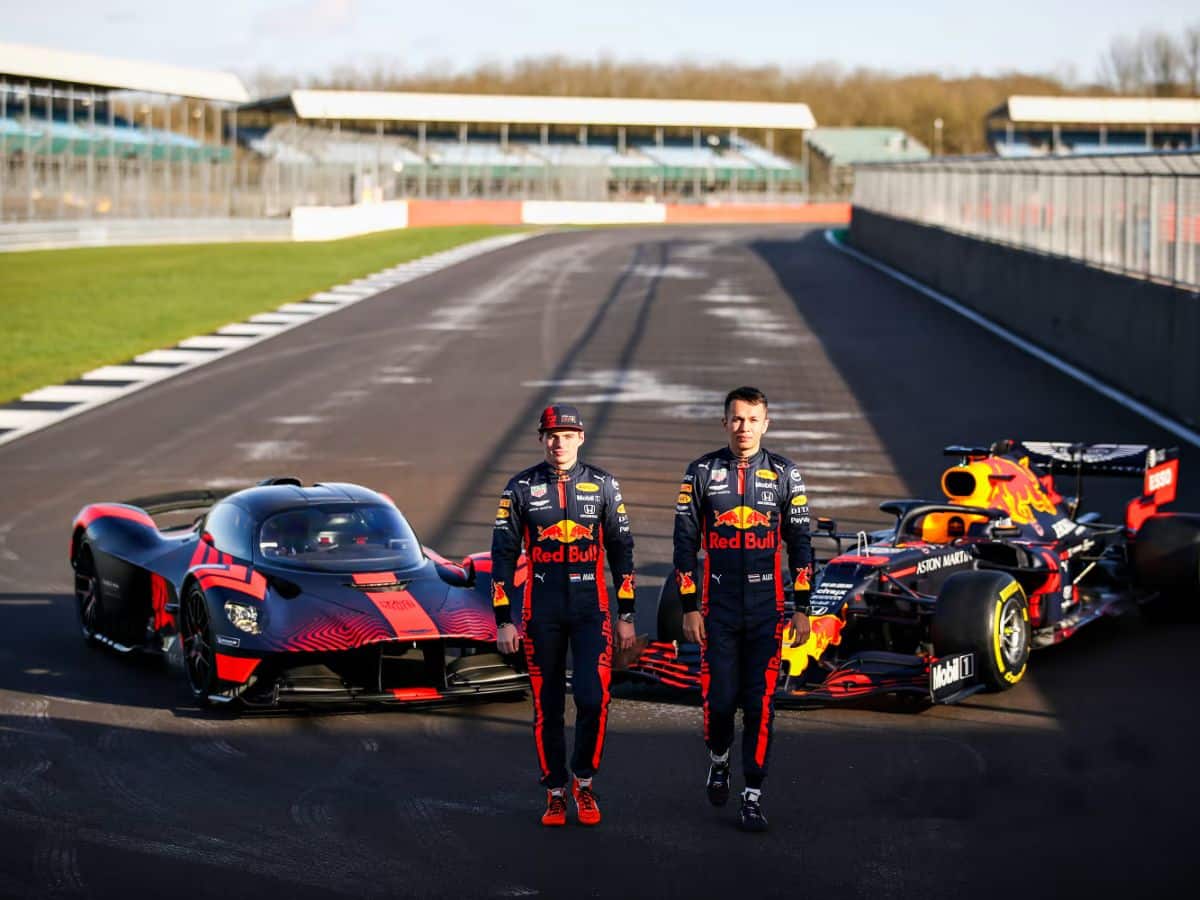 Max Verstappen and Alex Albon with the Aston Martin hypercar in 2019