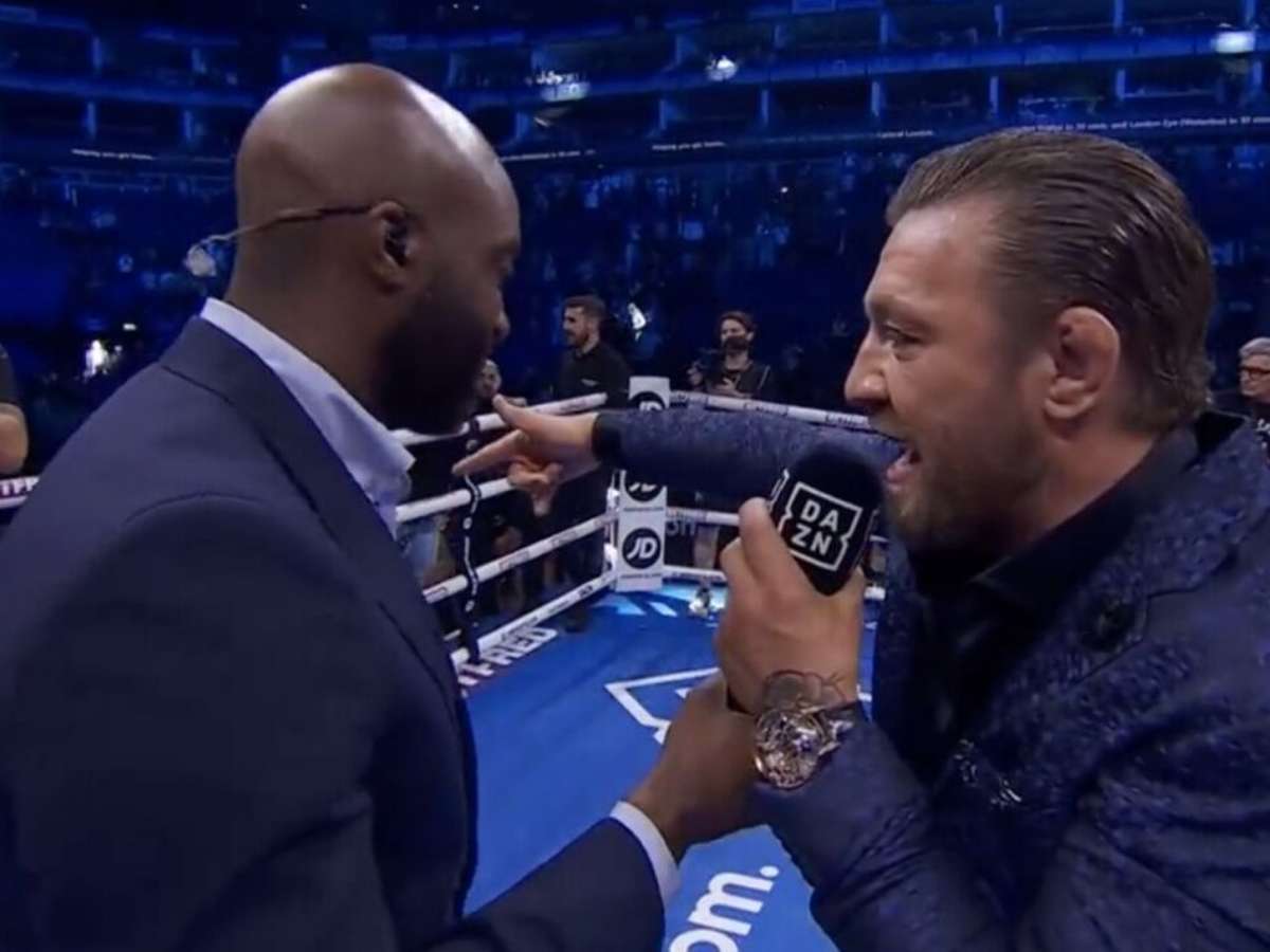 WATCH: Conor McGregor gets caught on camera wiping off Derek Chisora's sweat by sneaky hug with fan 1 Conor McGregor
