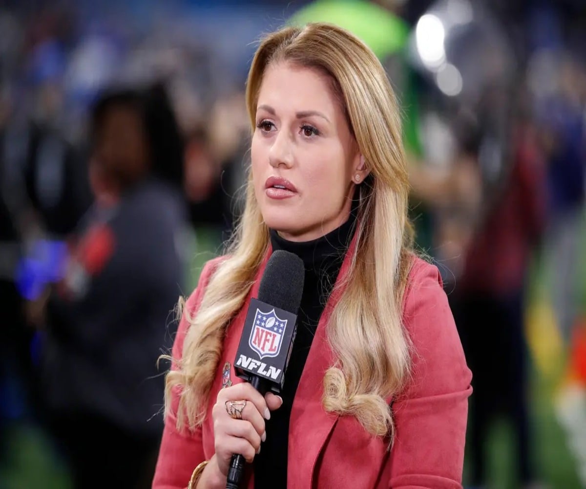 "Dumb ways to die!" NFL reporter Jane Slater tackles down a dummy at