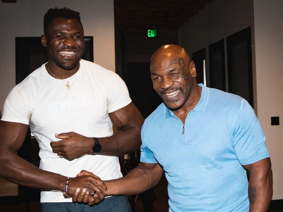 Francis Ngannou Mike Tyson