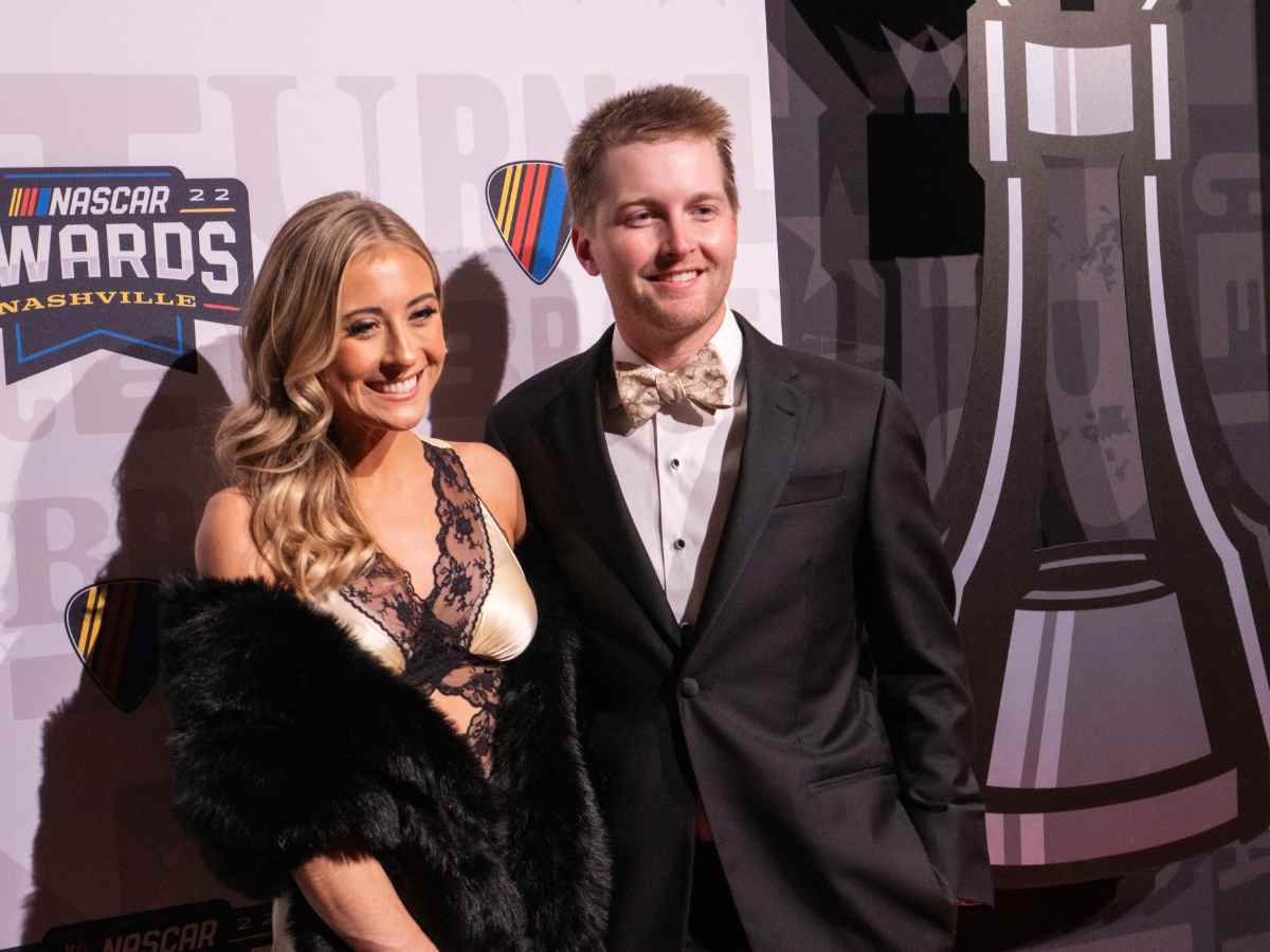 Erin Blaney as William Byron's plus one at a NASCAR party