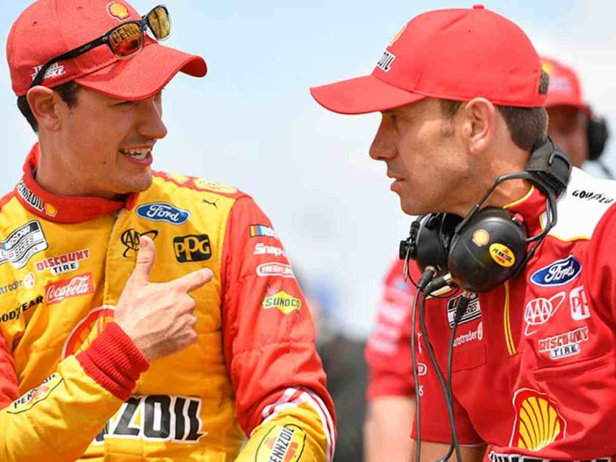 Joey Logano and Paul Wolfe