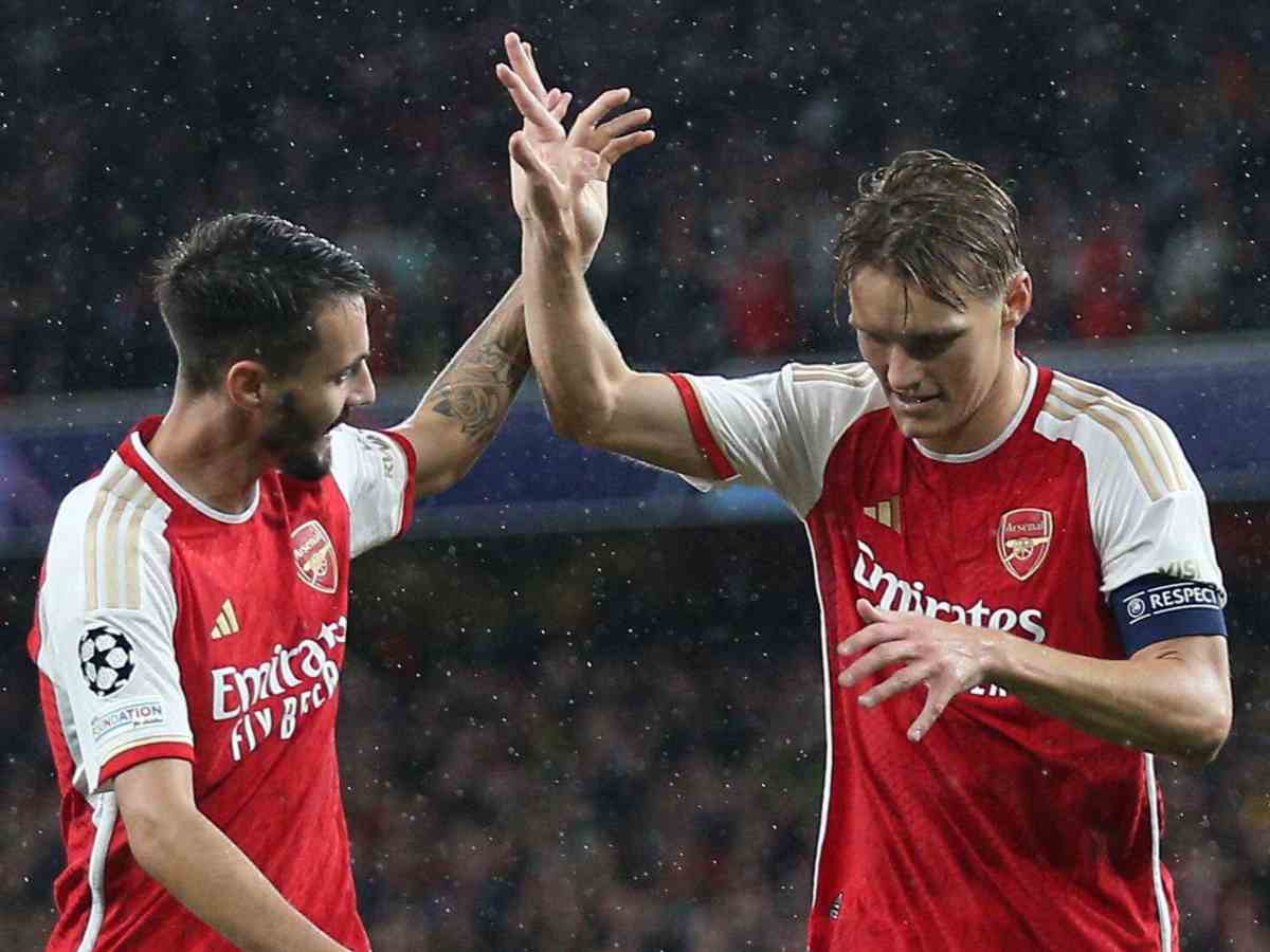 Fabio Viera and Martin Odegard celebrating Arsenal's goal.