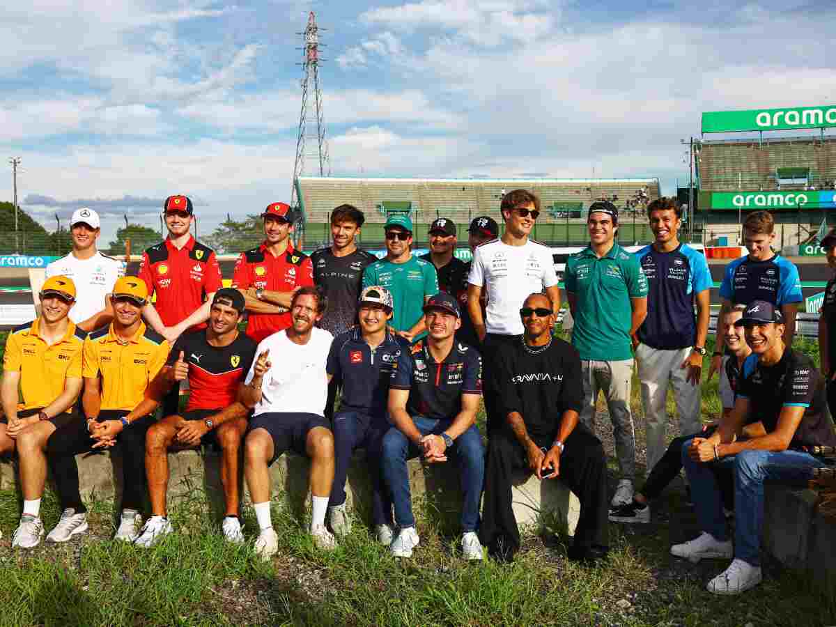 Sebastian Vettel with most of the drivers on the 2023 grid.