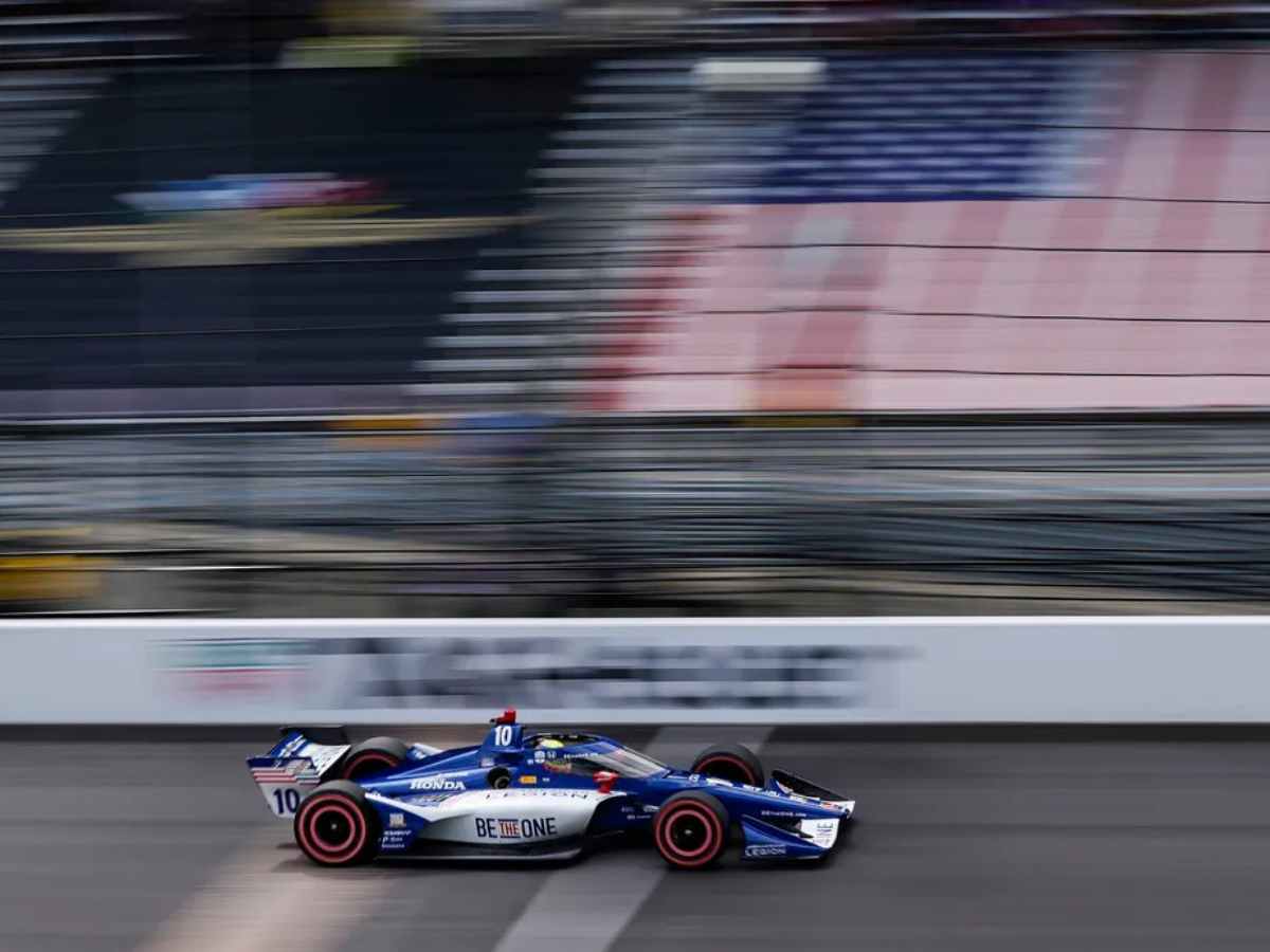 Alex Palou racing at the Indianapolis Motor Speedway.