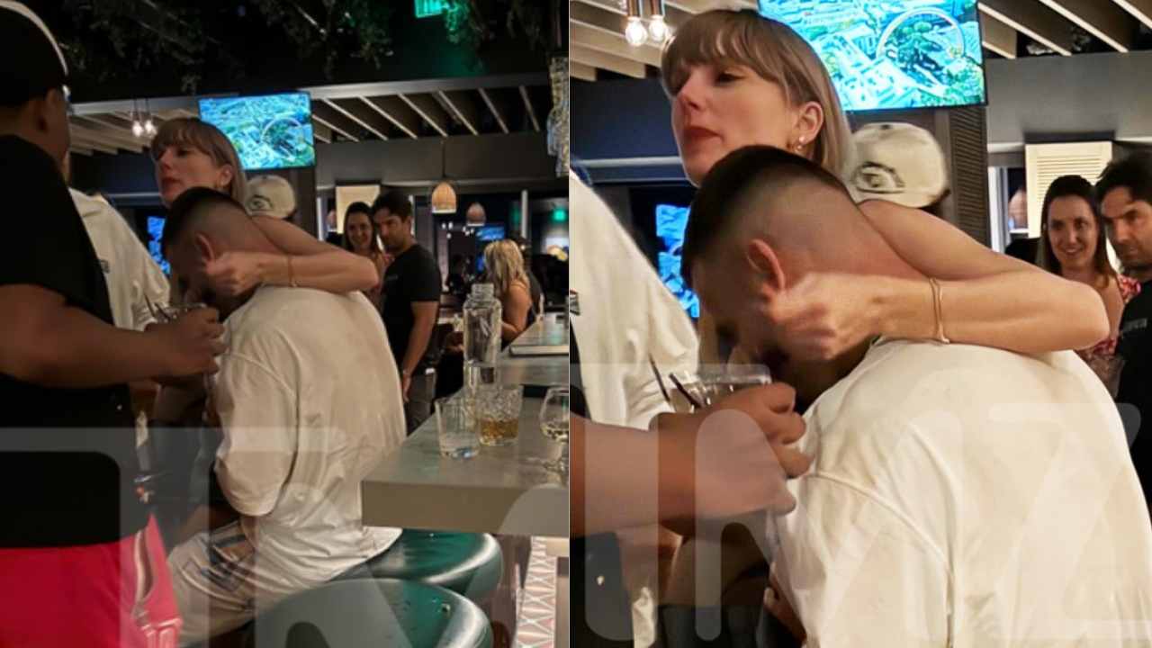 Taylor Swift spotted wrapping her arms around Travis Kelce during the after party following Chiefs’ win over Bears