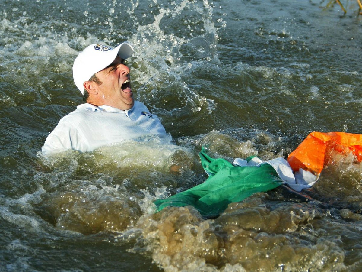 Paul McGinley Jumps in the Lake at The Belfry ( Image via The Independent )