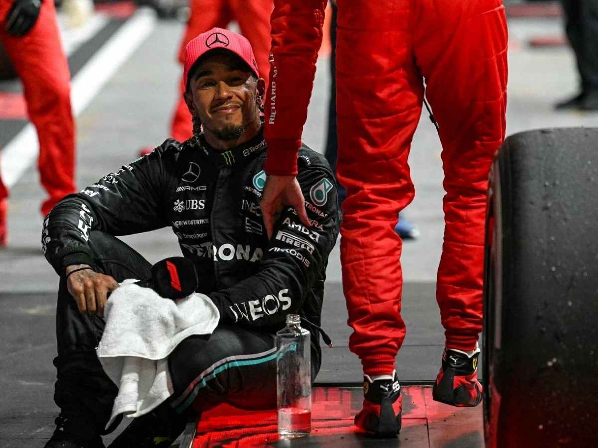 Lewis Hamilton being congratulated by Ferrari after Mercedes failed to show up