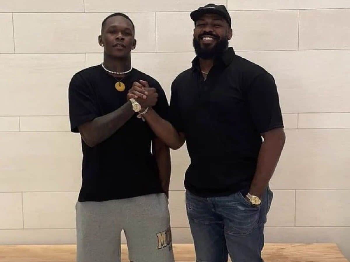 “Passed the torch” – Fans mercilessly troll Jon Jones for new friendship with Israel Adesanya as latter pleads guilty to DUI in court