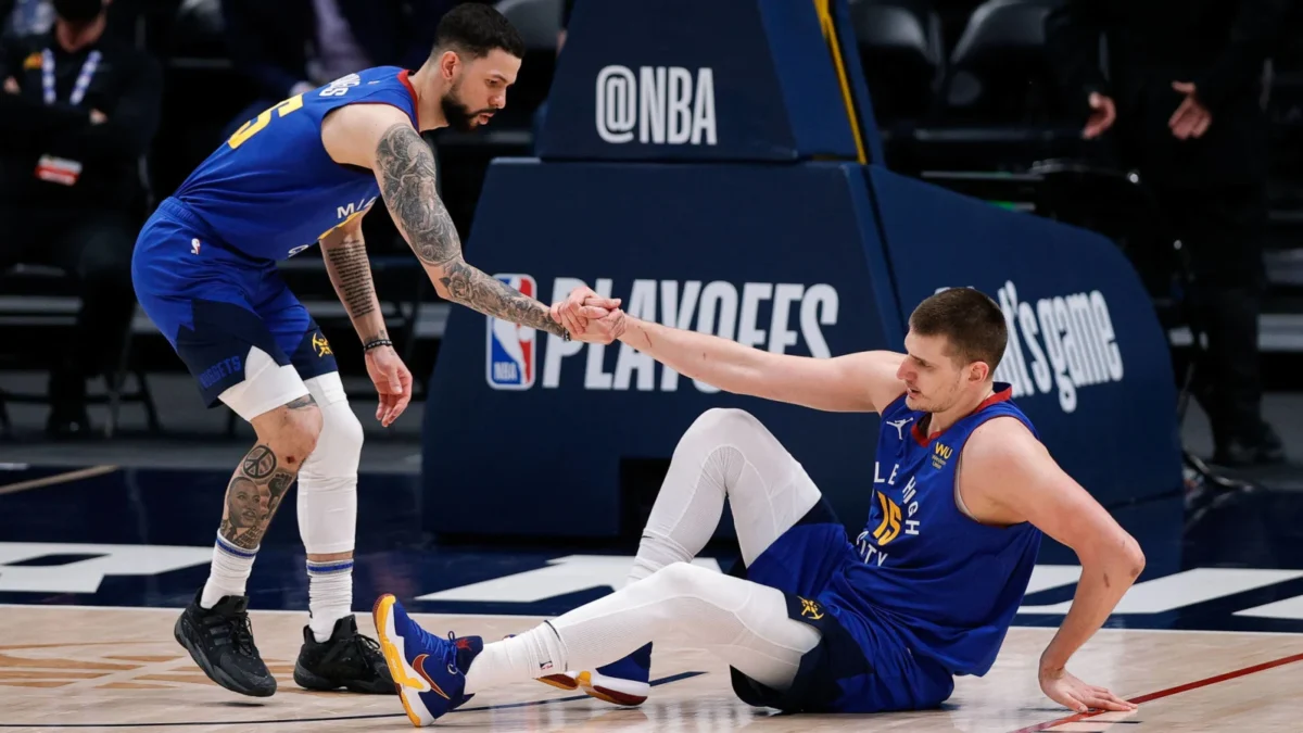 Austin Rivers and Nikola Jokic