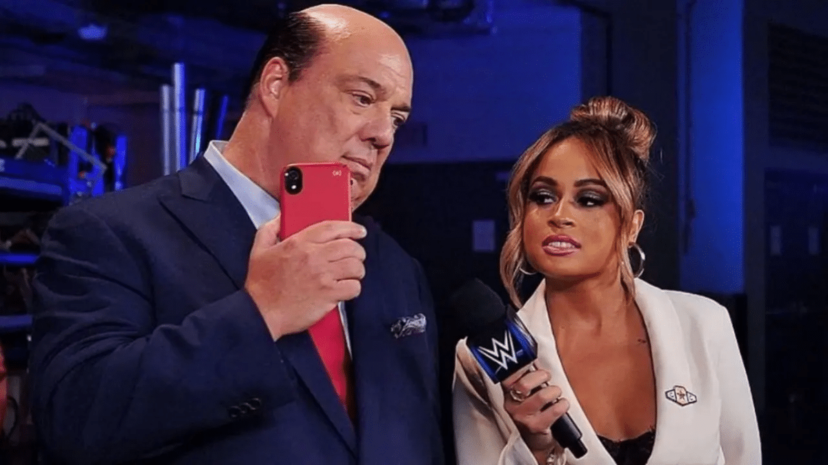 Paul Heyman of the Bloodline and Kayla Braxton