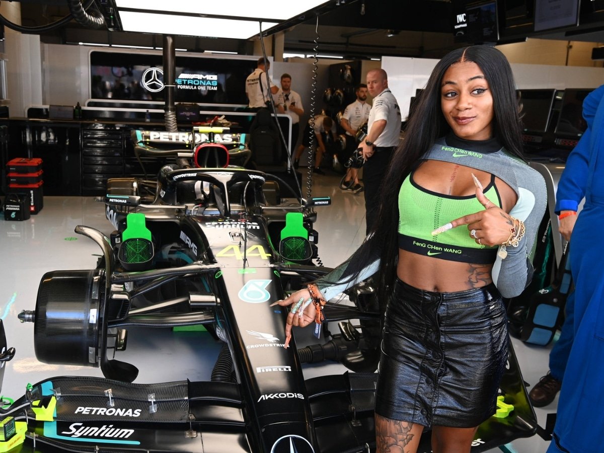 World No. 1 sprinter Sha’Carri Richardson poses in front of $285 million net worth Lewis Hamilton’s Mercedes at the United States GP