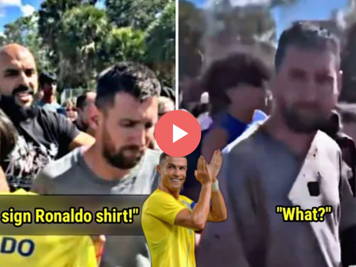 WATCH: Lionel Messi stares down a kid trying to get a selfie holding a Cristiano Ronaldo jersey