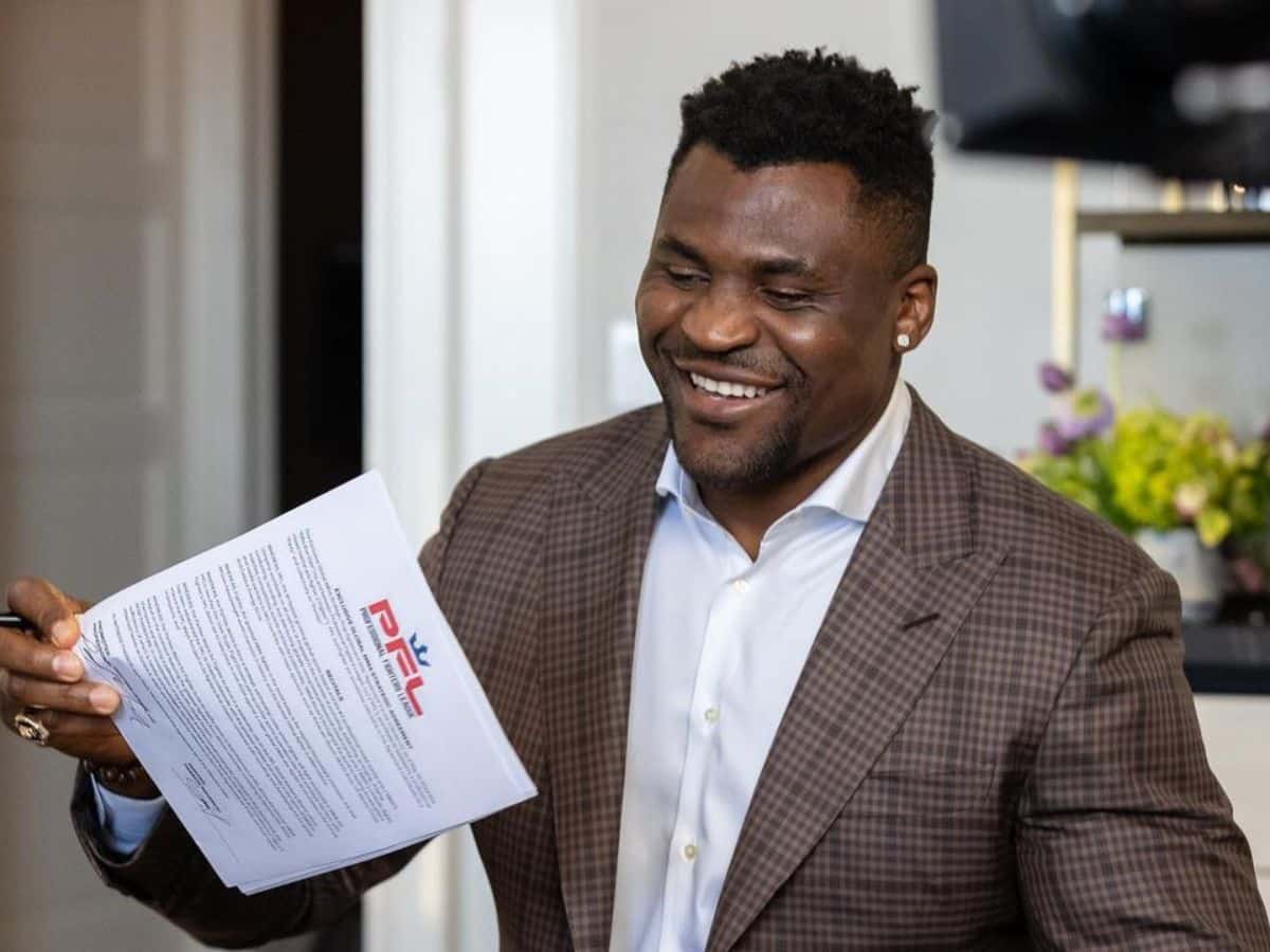 Francis Ngannou signing the PFL contract after leaving the UFC